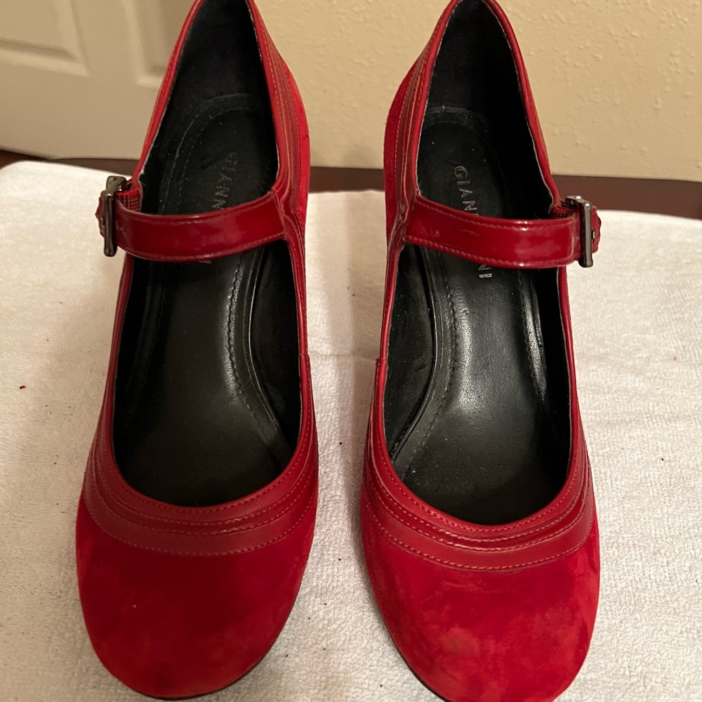 Red suade heel, gently warn, very comfortable.